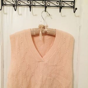 Cute pink sweater with no sleeves